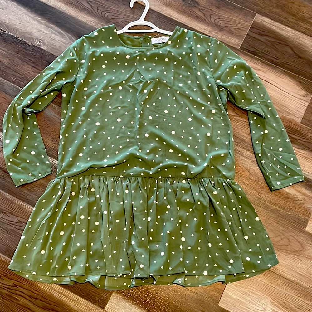 No longer wear, short green with white polka dot dress or top.